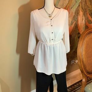 Grecian bohemian looking peplum blouse in poly
